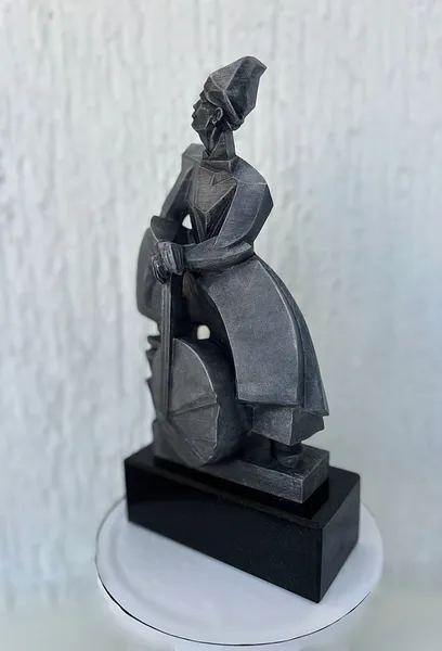 Image of HNAT KHOTKEVYCH by Roman Kykta, size: 300/150/80 мм, made of Polystone, gabbro, Sculpture Exhibition plastic arts medium, from Lviv, priced at $3000 Photo 3 of 5.